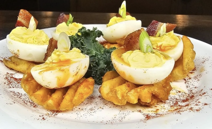 The Obstinate Sons signature dishes Deviled EggsChicken SandwichFrites Chicken Marsala